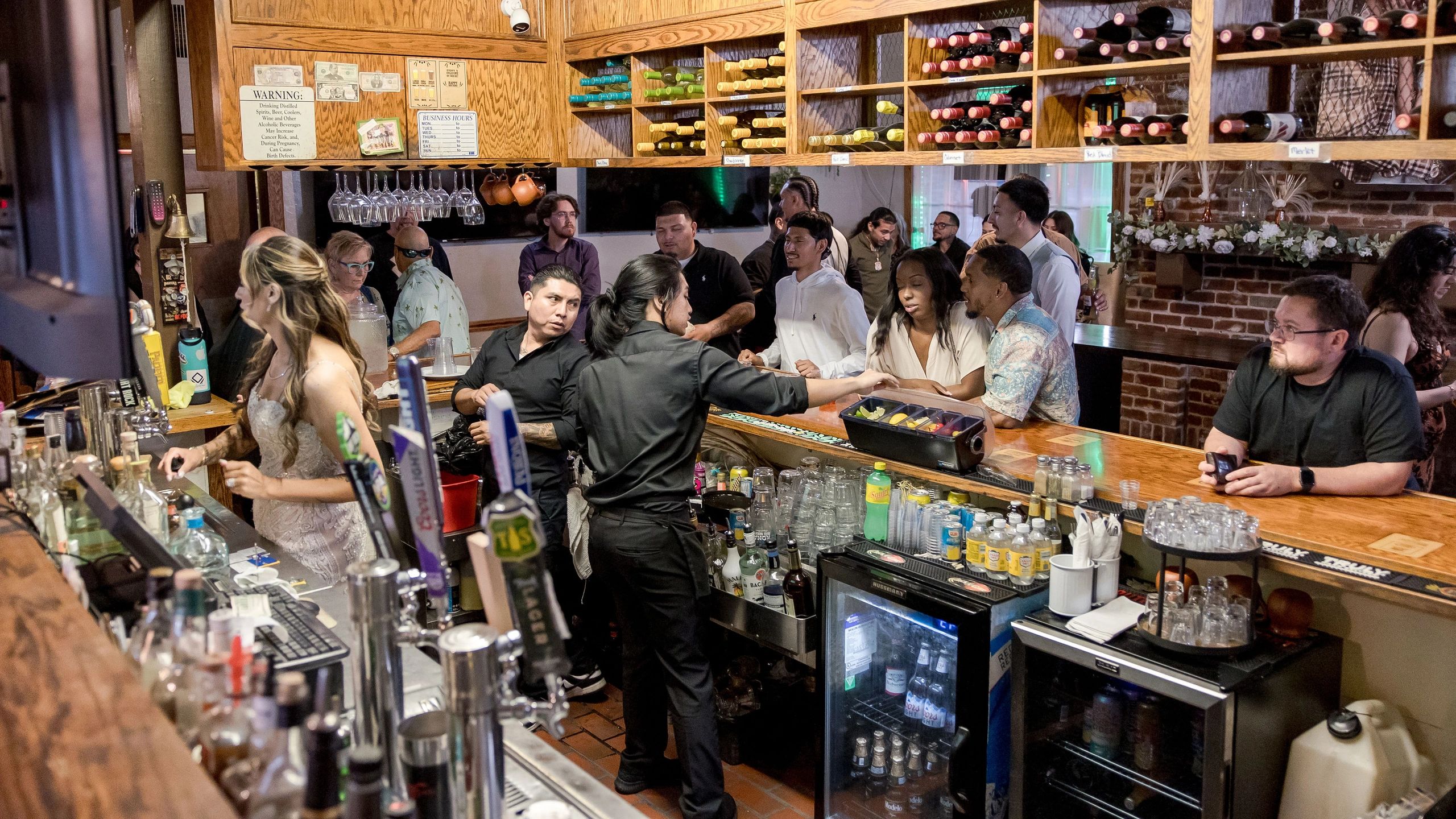 Lively crowd gathering at Brookside bar